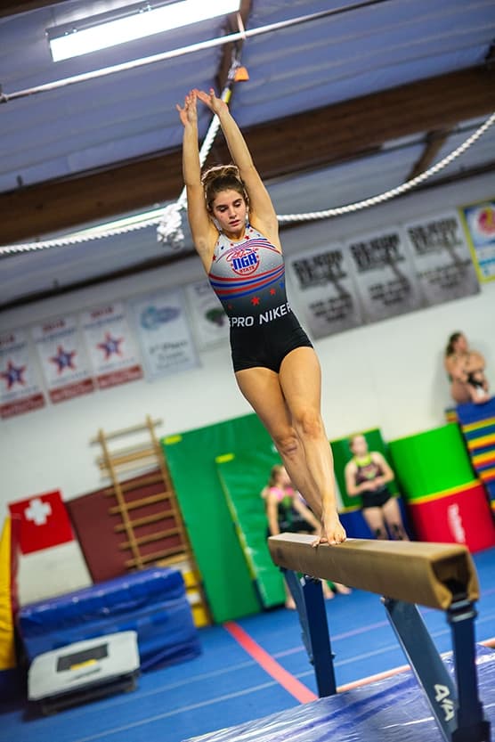 girl on beam